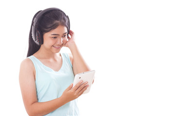 Portrait of young women using tablet pc and headphones. 