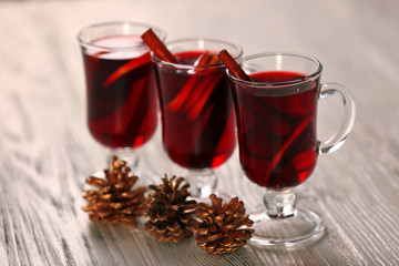 Mulled wine on wooden table