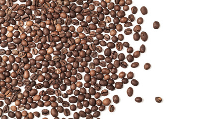 Layer of dark roasted coffee beans over white