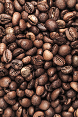 Closeup photo background with dark coffee beans