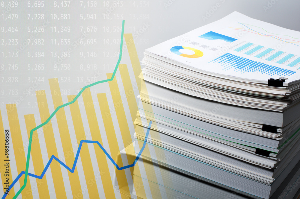 Poster Documentation and data analysis. Business concept.Pile of documents on gray background. Graph and data on monitor display.

