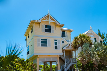 Blue sky with typical beach house in Florida Keys USA - 98807118