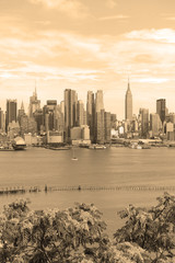 Obraz premium Manhattan skyline with Hudson River, New York City, sepia filter