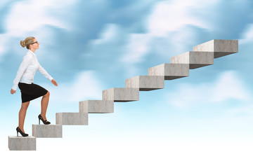 Businesswoman walking up a staircase. sky background