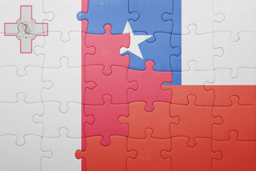 Fototapeta premium puzzle with the national flag of chile and malta