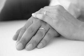 Hands with wedding rings