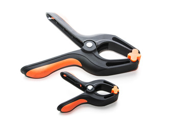 Obraz premium Plastic clamps used for clamping items isolated on white background