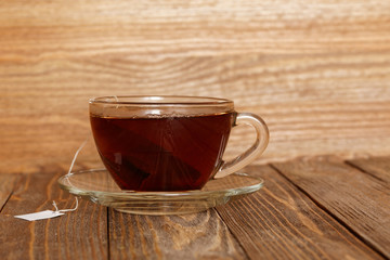 Closeup cup of tea on wooden table