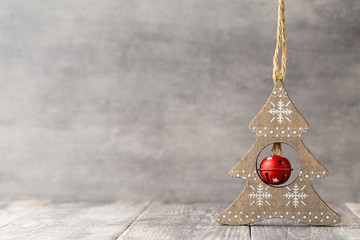 Christmas fir branch and decor, on the wooden background.