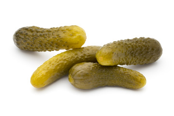 Pickled cucumbers isolated on white background.