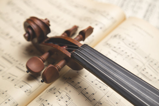 Vintage violin on the  sheet music.