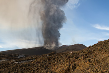 Volcano eruption. Mount Etna erupting from the crater Voragine
