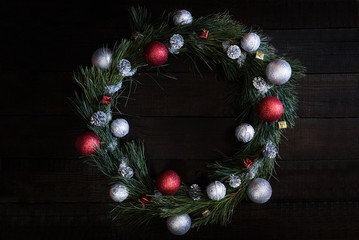 Christmas wreath of fir branches with Christmas decorations