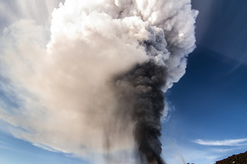 Obraz premium Volcano eruption. Mount Etna erupting from the crater Voragine 