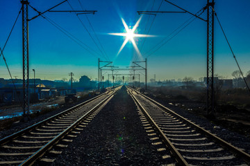 Fototapeta na wymiar Railroad and sunset
