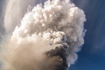 Volcano eruption. Mount Etna erupting from the crater Voragine
