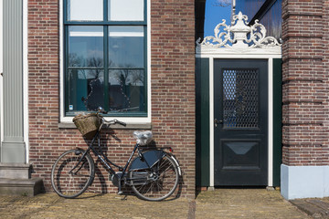 Traditional Dutch old wooden windmill in Zaanse Schans