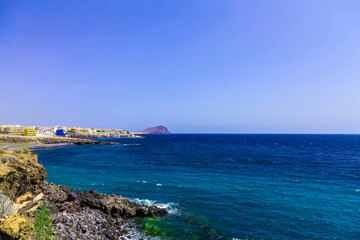 Coast of Ocean with Buildings