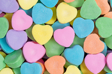 Happy Valentines day with colorful heart shaped candies - obrazy, fototapety, plakaty