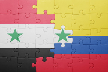 puzzle with the national flag of colombia and syria