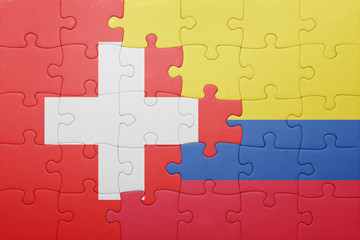puzzle with the national flag of colombia and switzerland