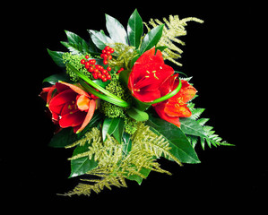 Bouquet composition with red amaryllis on black background