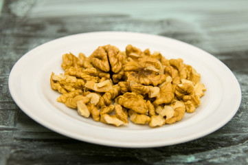 Walnuts Shelled on Texture Background in Blue