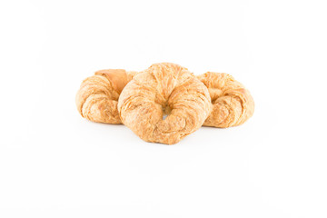 fresh and tasty croissant on basket wooden isolated in white bac