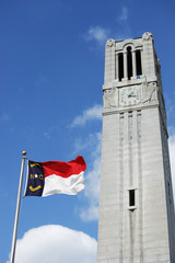 bell tower and North Carolina state flag