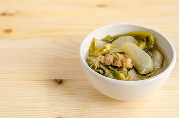 Chinese vegetable stew, mixture of vegetables and pork on wooden