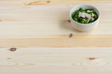 Stir Fried Pork with Chinese Chives Flower and Garlic on wooden