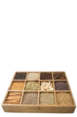 Variety of spices in wooden box 