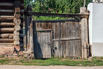 old wooden gate with a wicket