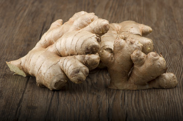 Ginger root sliced on the wooden table