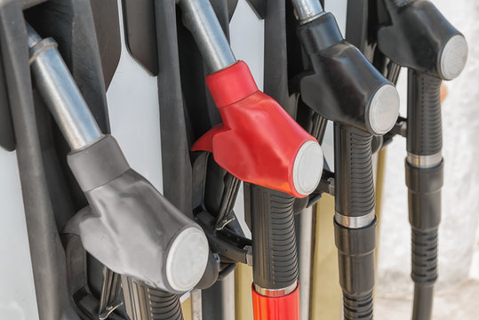 close view of red gas pump