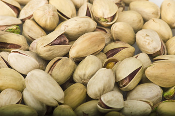 Group of pistachio close up on white