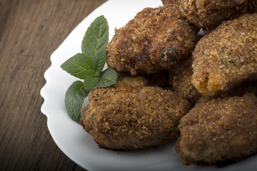 plate of meatballs on the wooden table