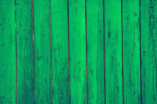 Texture of a green wooden planks, bright wall, rustic style