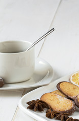 Assorted Cookies and coffee on wooden table