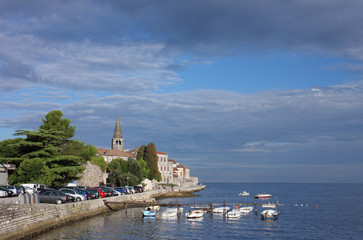 Fototapeta na wymiar View of coastal town of Porec in Croatia in the morning