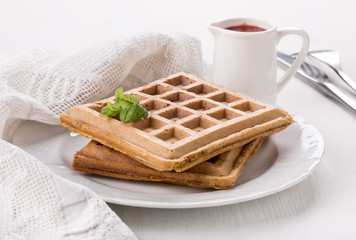 Belgian waffles on a white plate