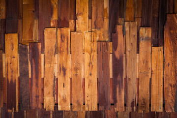 irregular wood dark brown plank texture background, with vignette