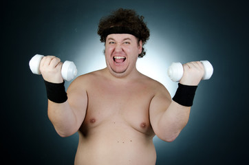 Fototapeta na wymiar The fat man and Fitness. 