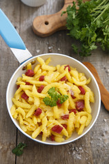 Fresh spaetzle pasta with cheese and bacon