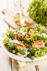 Grilled salmon salad with yogurt dressing