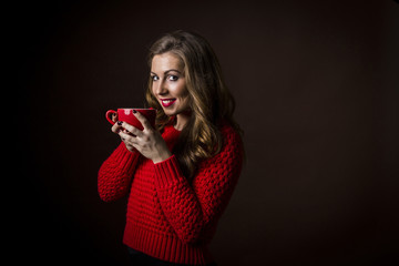 Young woman with hot tea