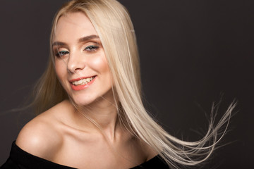 Portrait of a girl on a black background