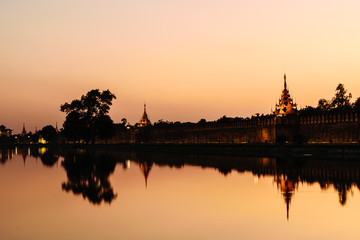Fototapeta na wymiar Moat and Fort of Mandalay palace at sunset
