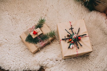 Obraz na płótnie Canvas Two Christmas gift boxes in sheep's clothing
