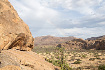 rock formation with rainbow in the Erongo Mountains, Namibia